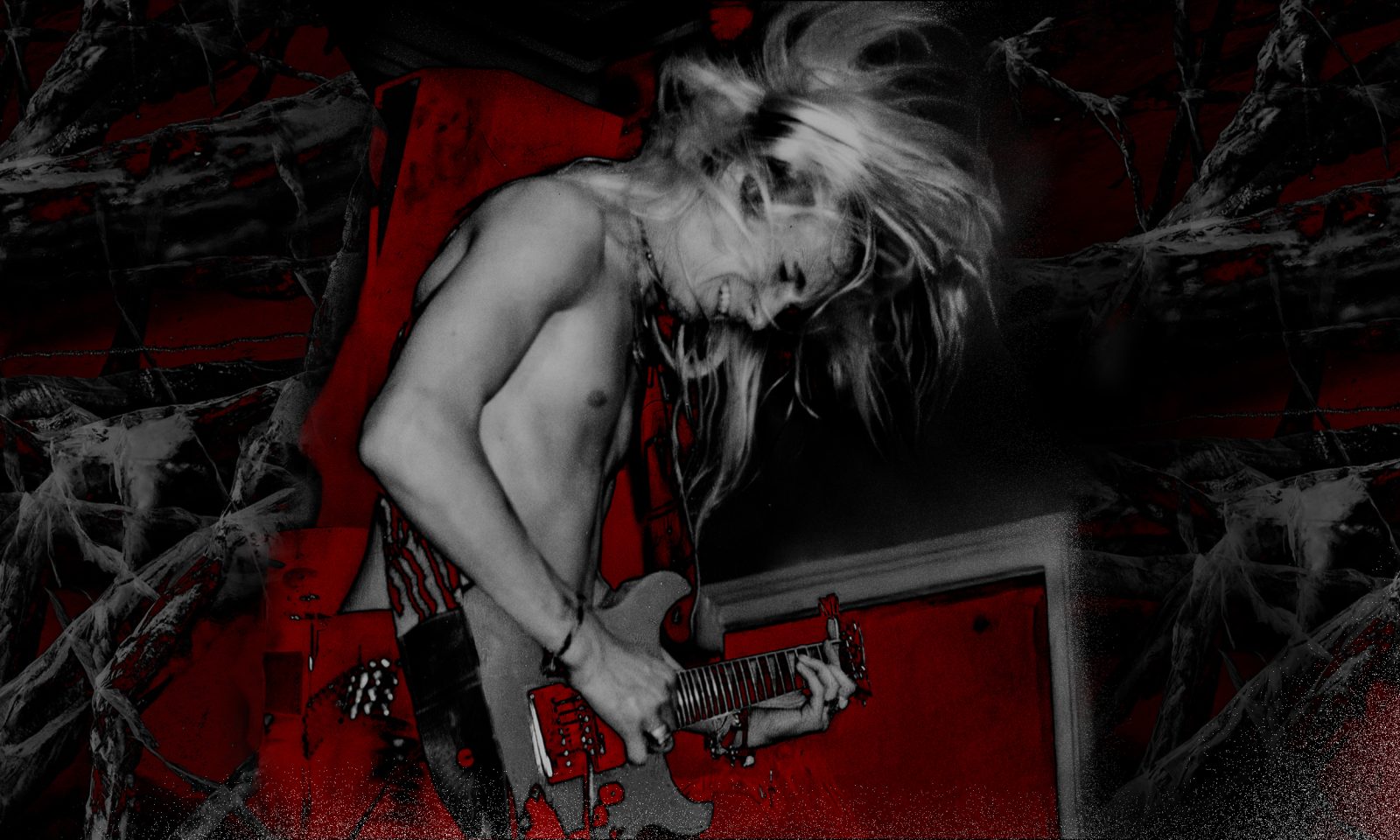 Pitkähiuksinen henkilö soittaa kitaraa.